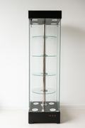 "Glass Display Cabinet with LED Lighting and Rotating Shelves"